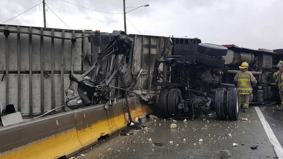 Photos: Tractor-trailer rollover crash closes Interstate 70