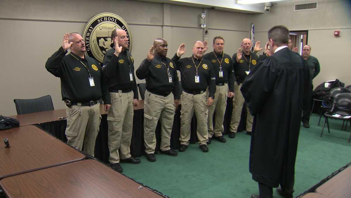 Gateway police officers sworn in, will carry guns in schools