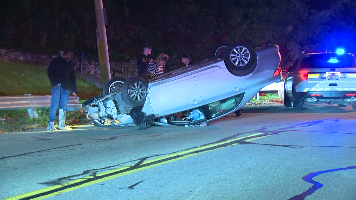 Car ends up on its roof following crash in Morningside