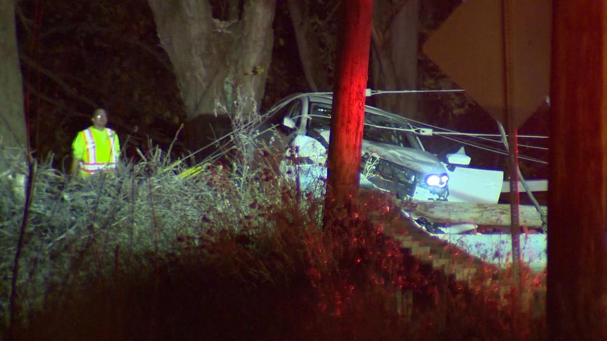 Wires down on car after crash in North Versailles