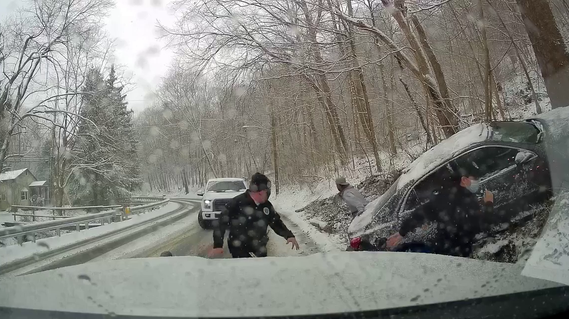 WATCH EMS workers nearly struck by truck while on scene of crash