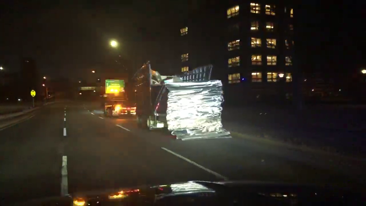 Overheight truck has roof sheared off on Soldiers Field Road