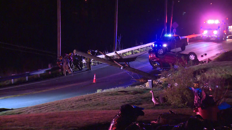 Pole down, car overturned following Penn Hills crash