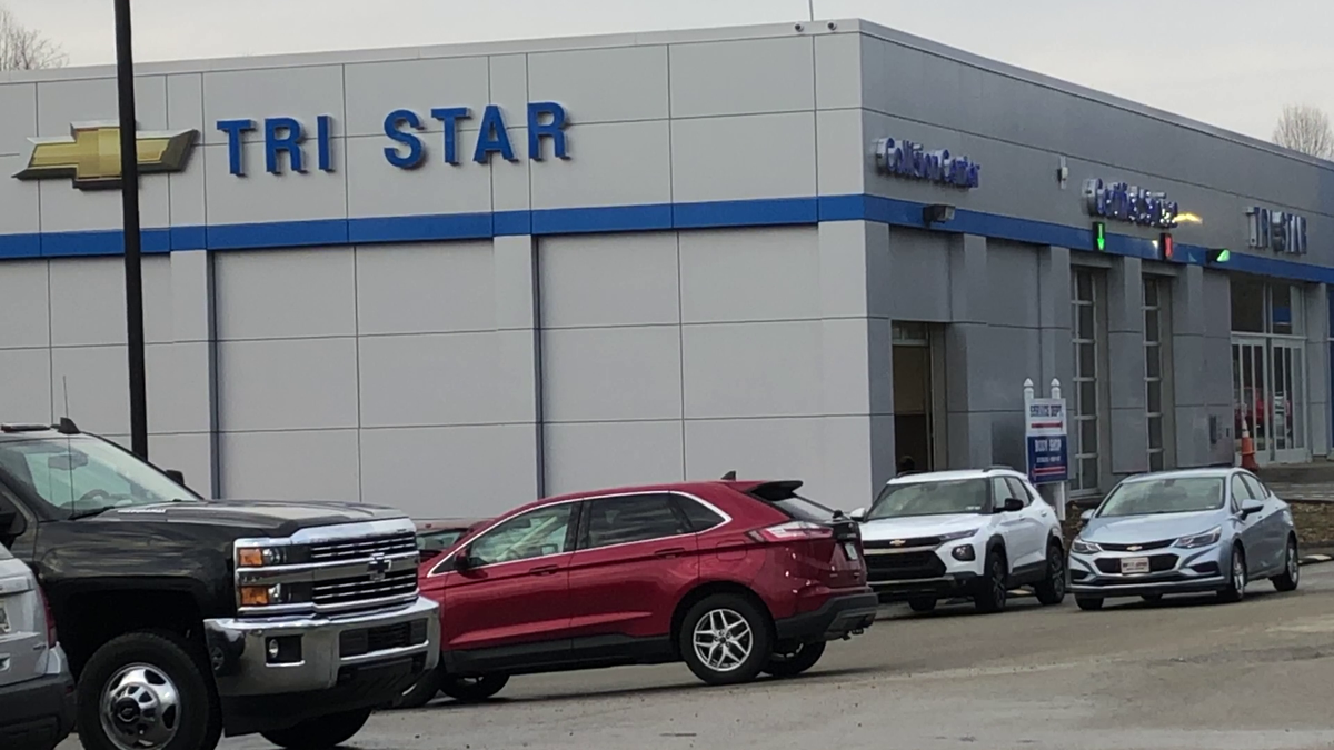 Two people injured after truck falls on them at car dealership in Fayette County