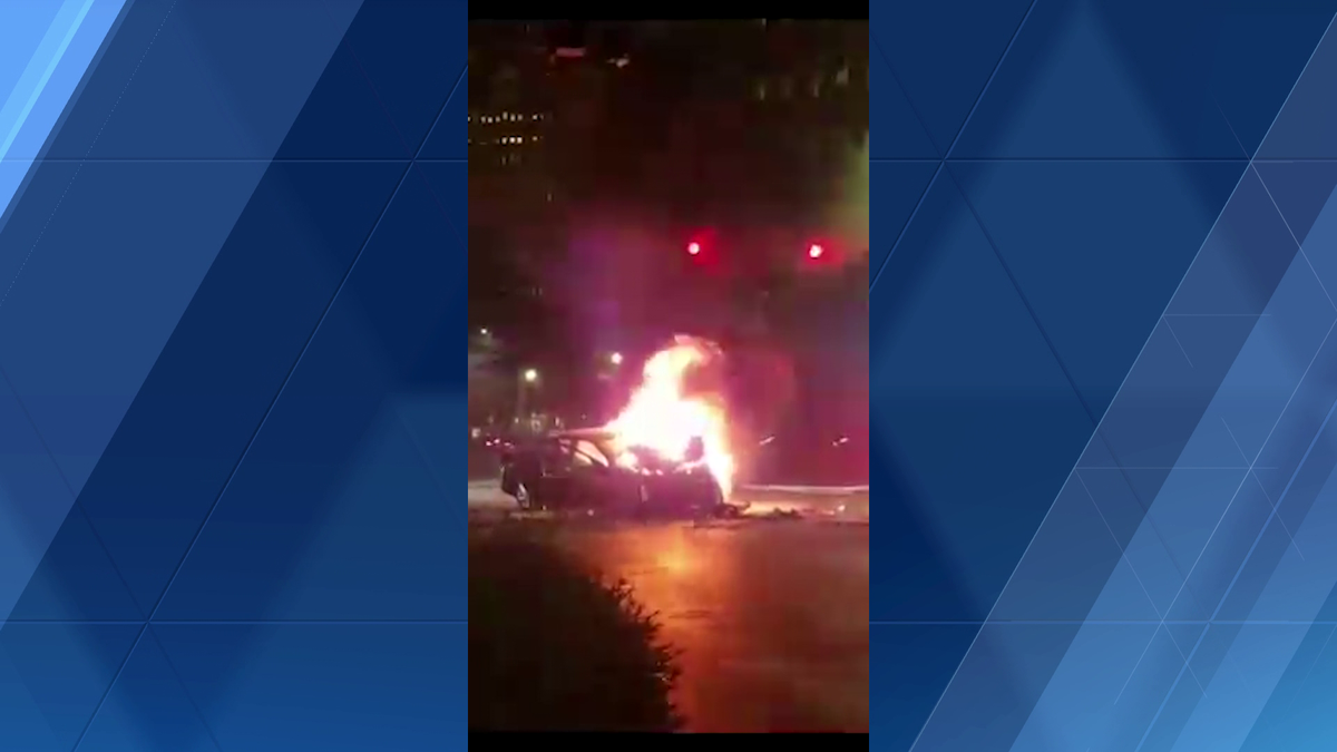 Police officers free man from burning car following crash in Downtown Pittsburgh