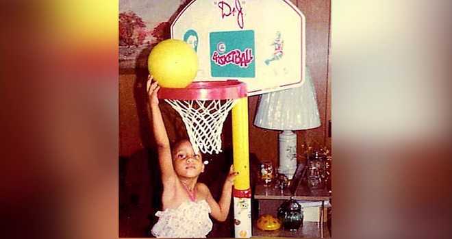&#xFEFF;a&#x20;younger&#x20;chandi&#x20;chapman&#x20;with&#x20;a&#x20;basketball&#x20;hoop&#x20;bought&#x20;at&#x20;hills.