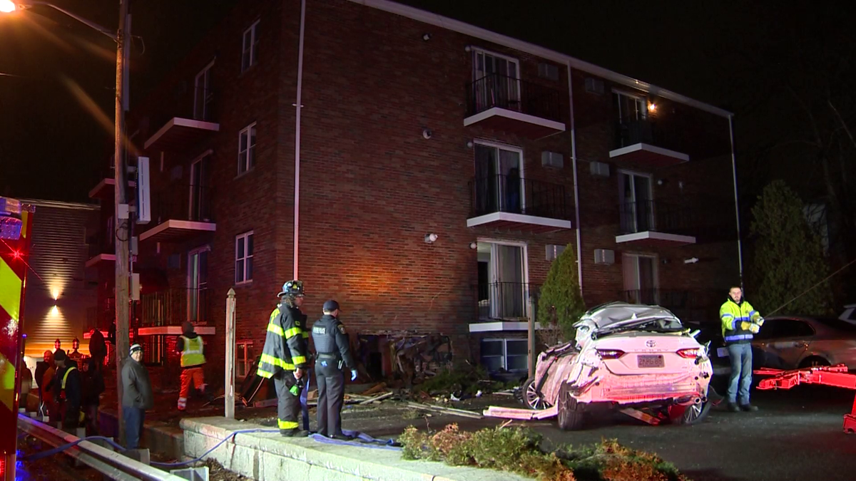 Car crashes into Revere apartment building injuring two people