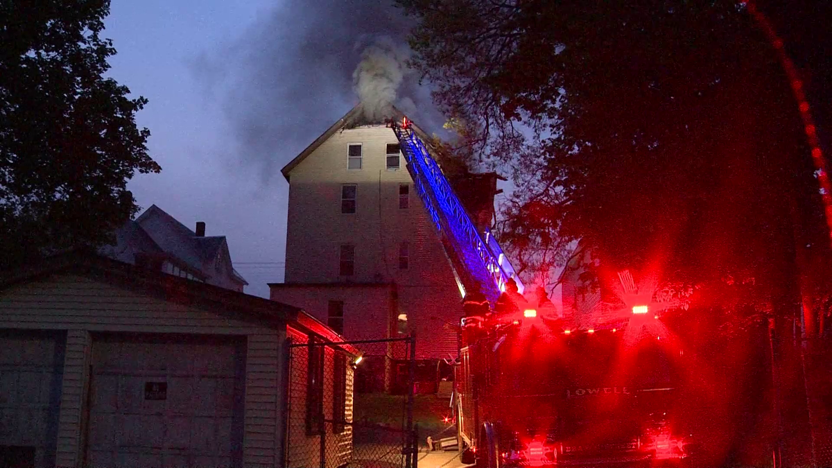 Crews battle house fire in Lowell, Massachusetts
