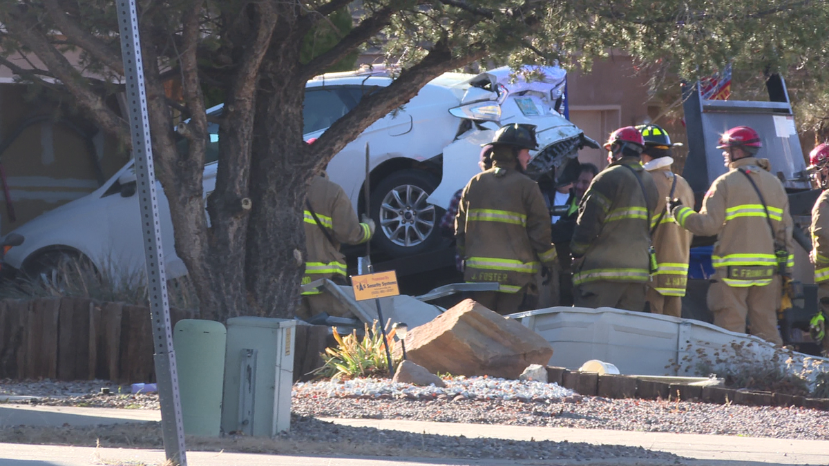 One dead after car crashes into home in northeast Albuquerque(01)