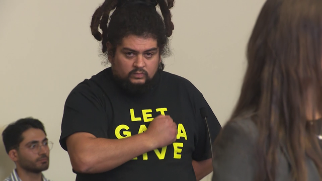 'I'm not disturbing the peace. I'm disturbing your peace': Boston protester arrested at Charlie Kirk vigil says