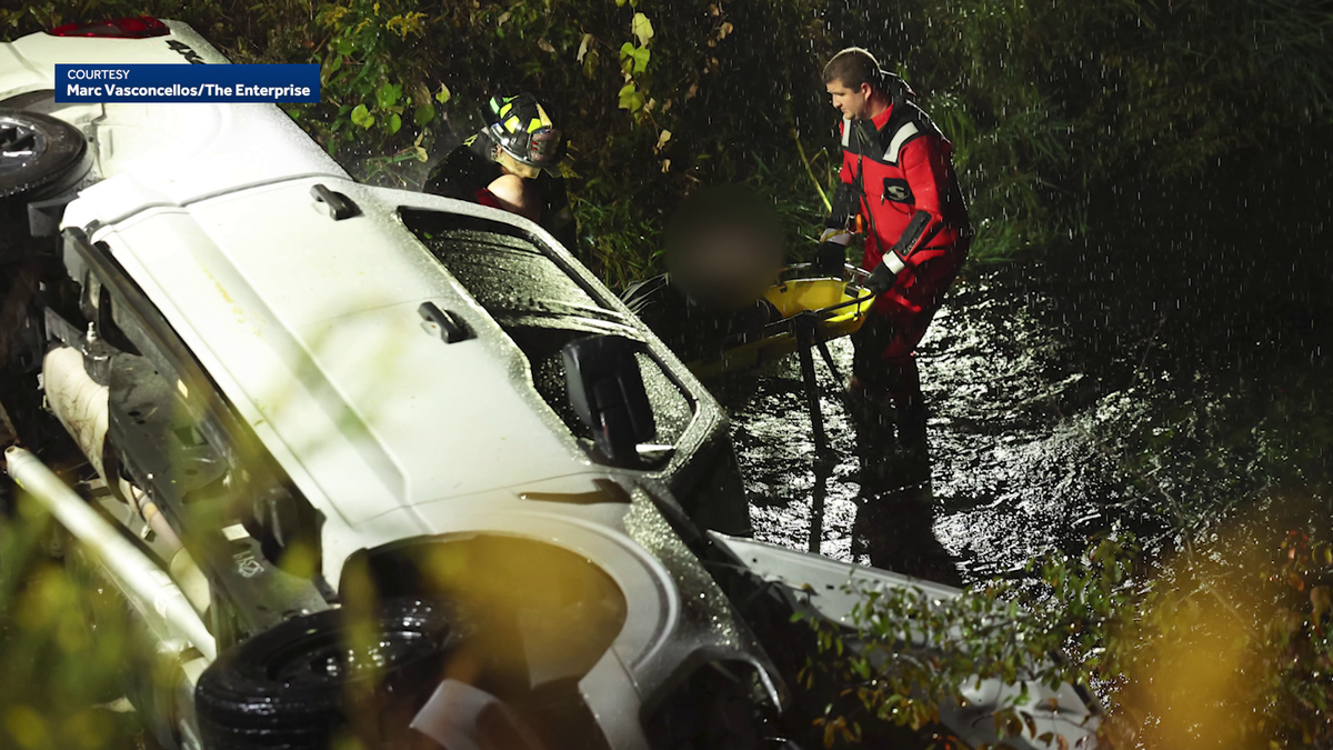 Man, dogs rescued after pickup truck crashes into East Bridgewater river