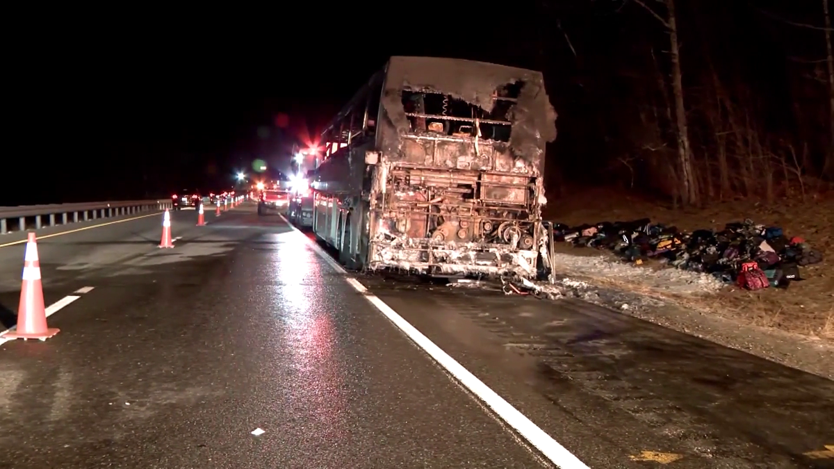 One injured after bus carrying Mass. students catches fire