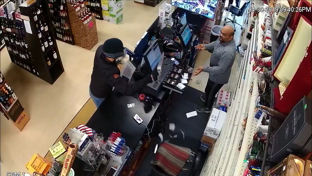 Warrant issued for suspect in liquor store robbery involving large knife