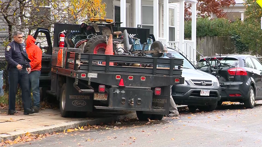 Boston officer hit by stolen truck, suffers minor injuries