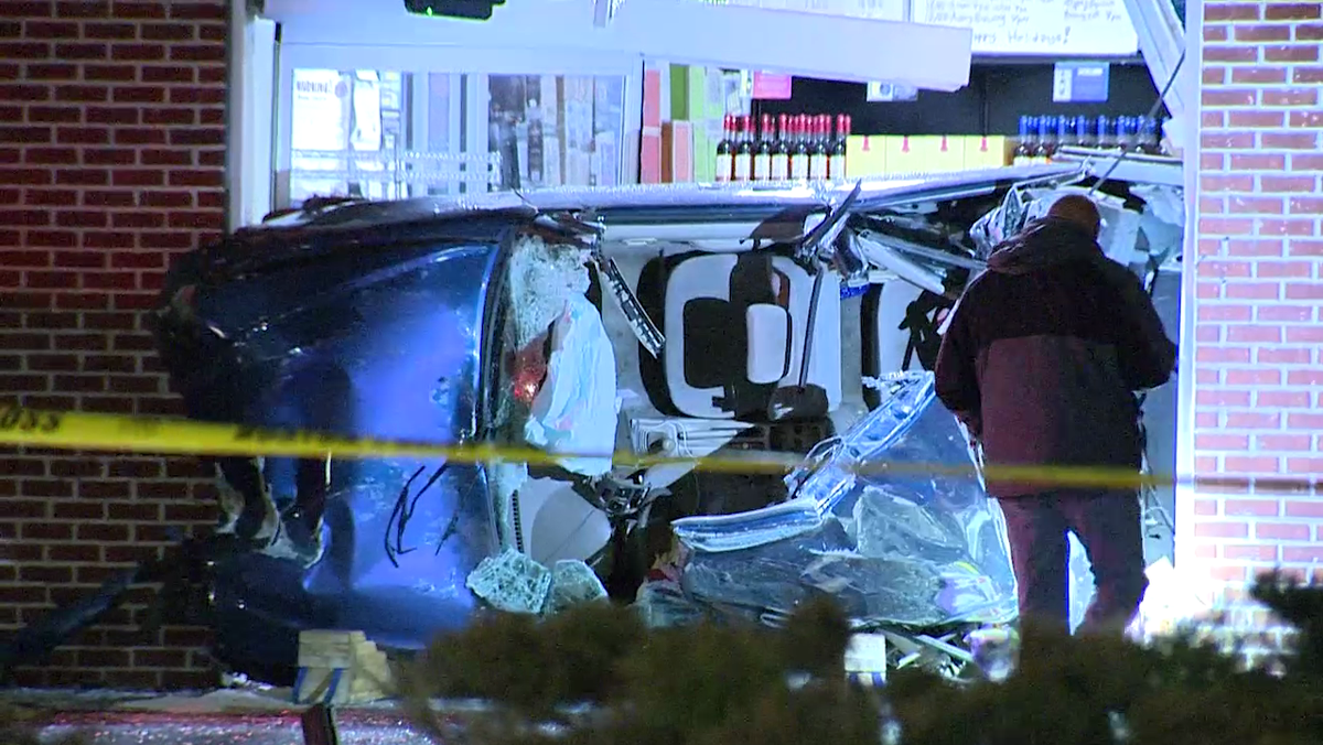 Driver seriously injured when car crashes into liquor store