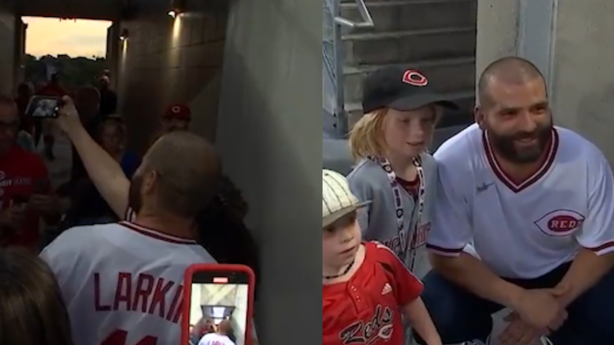 Watch: Injured Reds star Joey Votto watches game with fans in the stands 