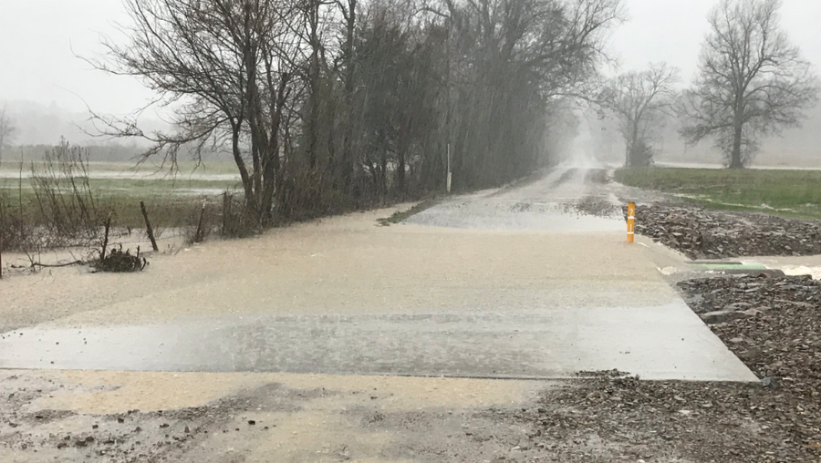 Flooded road in Waldron near Highway 71