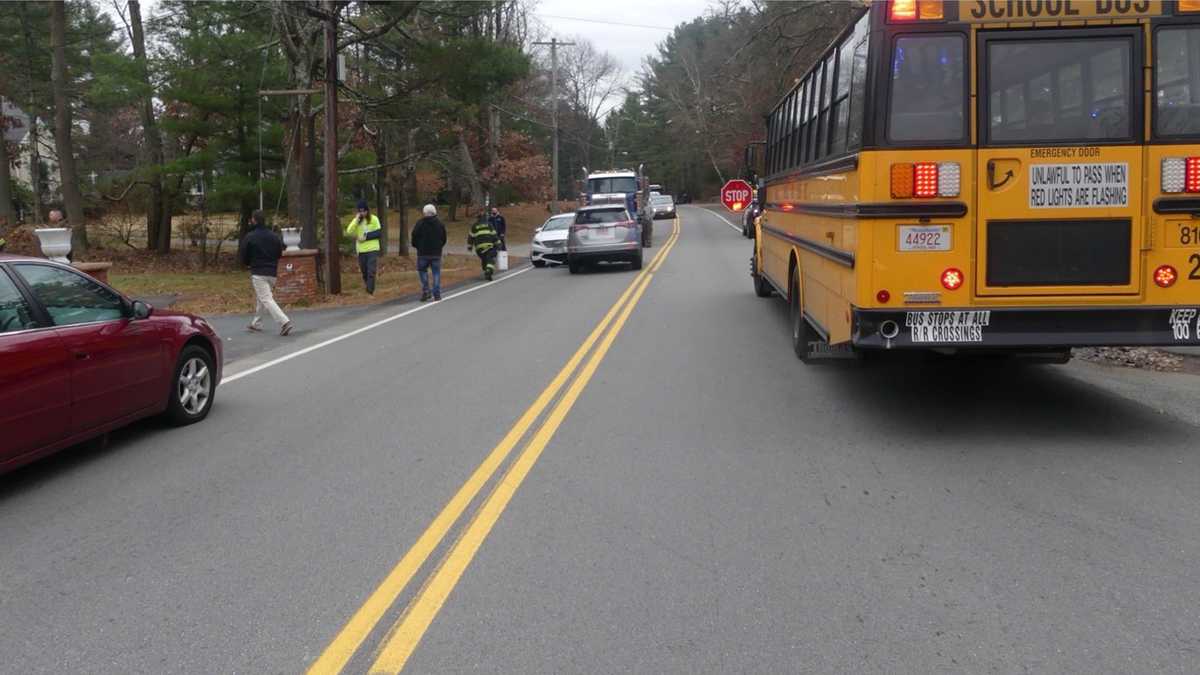 Driver passes stopped Walpole school bus, crashes into other cars
