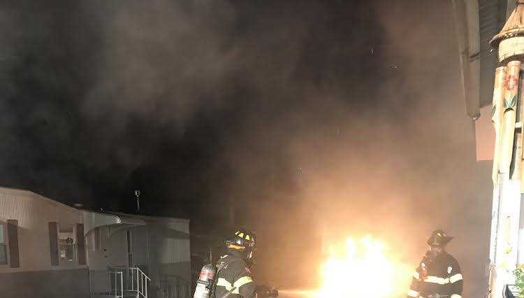 Electric car spontaneously catches fire in Mass. home's driveway - Vimarsana News