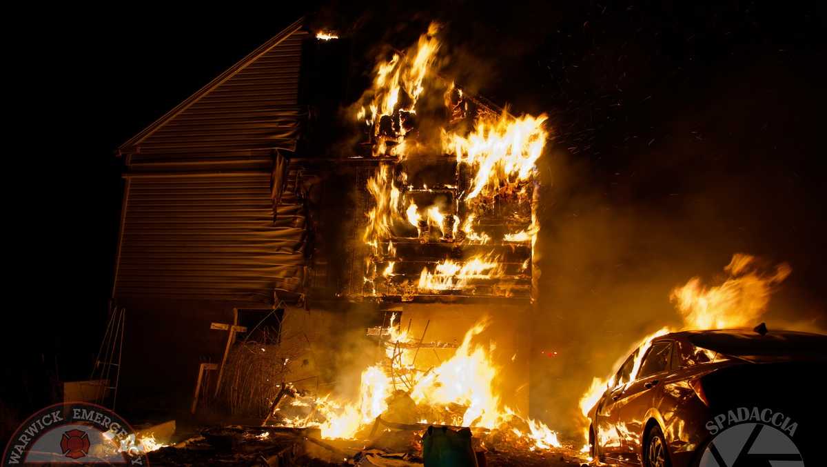 Heavy flames shoot from burning house, car in Lancaster County, Pa.