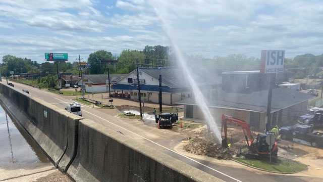 Water shoots high in the air after line break in Jackson