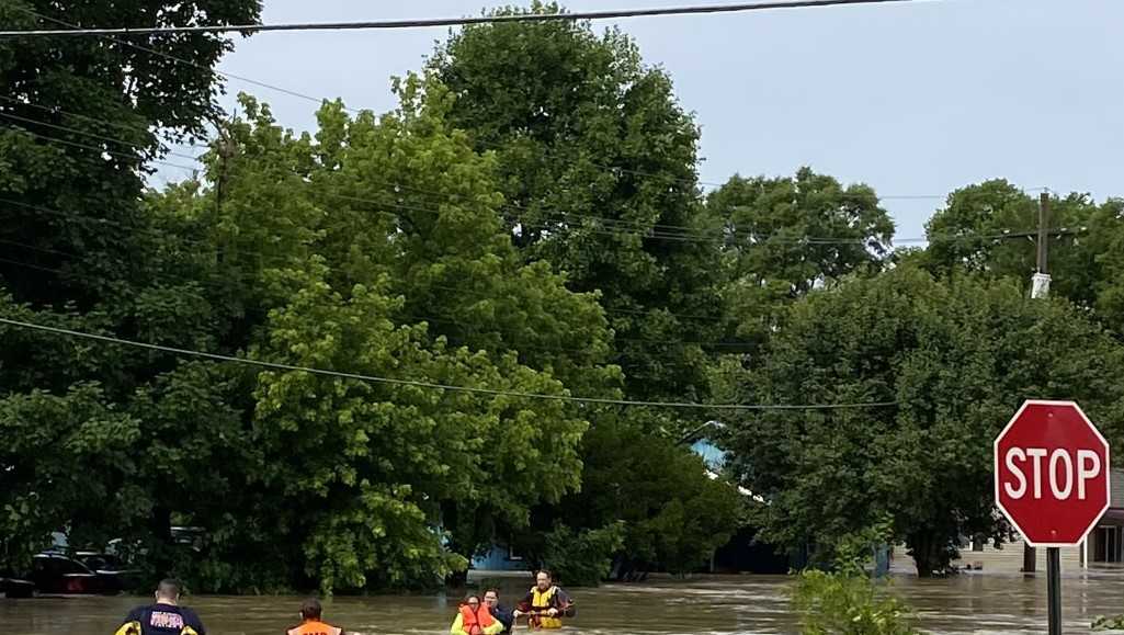 Multiple people rescued after town of Guilford 'almost completely flooded'(00)