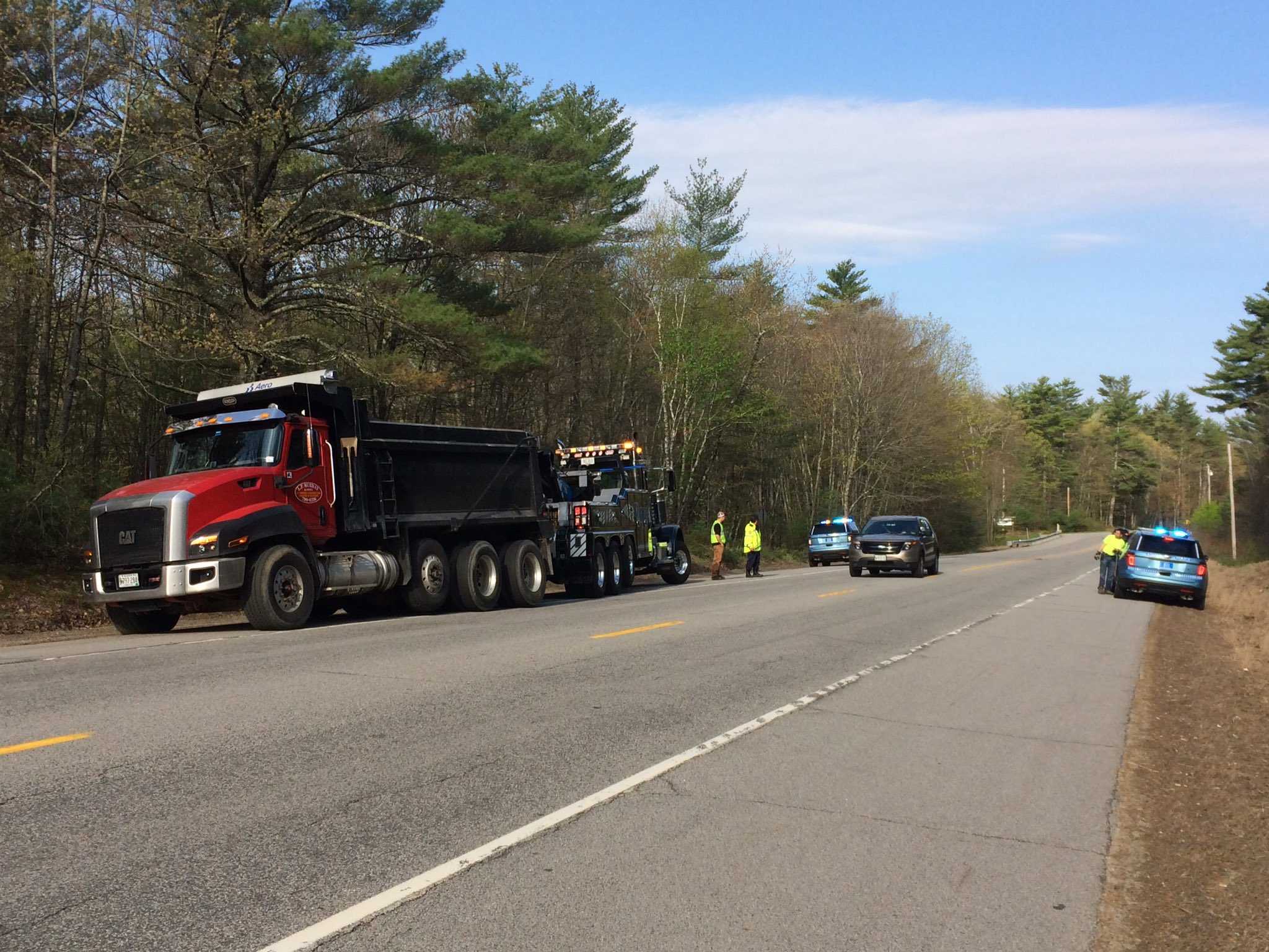 Driver Seriously Injured After Car Slams Into Parked Dump Truck, Police Say