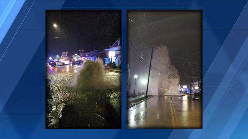 Water main break splits roadway, sends water shooting into air