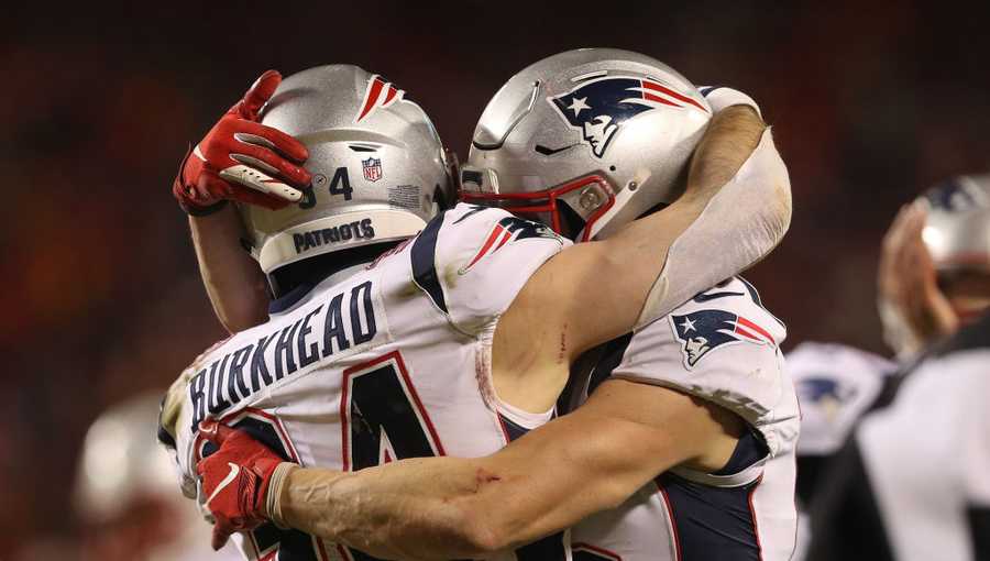 Rex Burkhead #34 of the New England Patriots celebrates with Chris Hogan #15 after rushing for a 4-yard touchdown in the fourth quarter against the Kansas City Chiefs during the AFC Championship Game at Arrowhead Stadium on January 20, 2019 in Kansas City, Missouri.