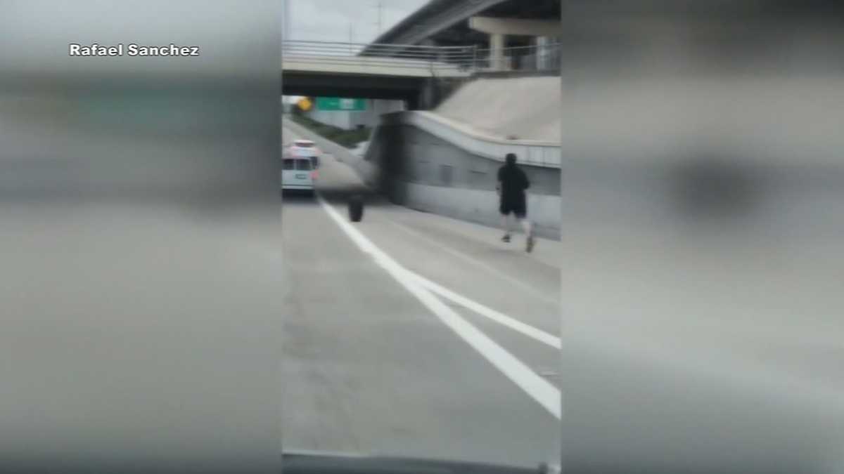 Watch Driver Caught On Camera Chasing Runaway Tire On Highway 9103