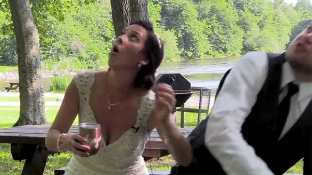 A couple dodged a falling tree branch after their wedding ceremony while they were sitting on a picnic table.