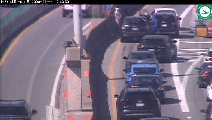 Report of a crash on I-74 west near Northside, blocking traffic