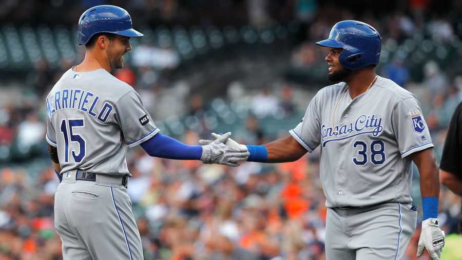 Kansas City Royals' Whit Merrifield (15) celebrates his lead off solo home run with Jorge Bonifacio (38) against the Detroit Tigers in the first inning of a baseball game in Detroit, Tuesday, July 25, 2017. (AP Photo/Paul Sancya)