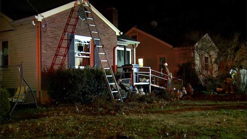 Woman rescued from burning home in south Louisville
