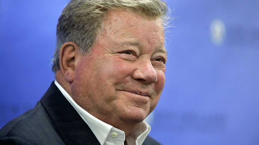 Actor William Shatner smiles while taking questions from reporters, Sunday, May 6, 2018, after delivering the commencement address at New England Institute of Technology graduation ceremonies, in Providence, R.I. Shatner was presented with an honorary doctor of humane letters degree during the event.