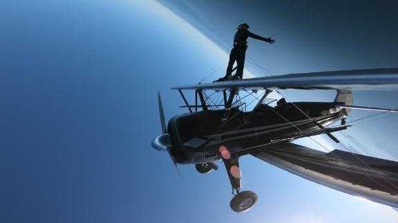This filmmaker bought a one-way ticket around the world and learned how to walk the wings of a 1940s biplane.