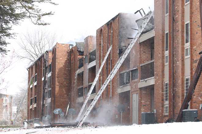 Multiple families displaced after 3-alarm fire in Woodlawn