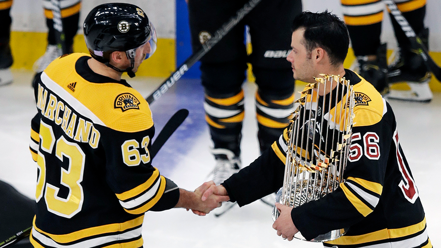 Red Sox bring World Series trophy to Bruins game