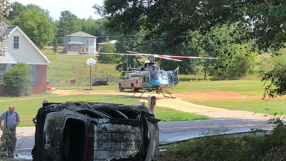 Woman ejected from vehicle in crash near Williamston; vehicle catches