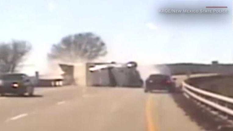 Wrong Way Police Chase Causes Semi Rollover 