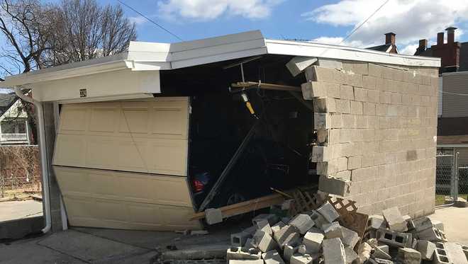 Car crashes through concrete wall in York