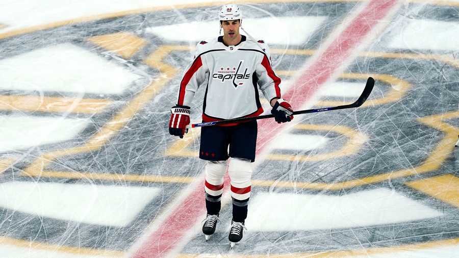 Washington Capitals defenseman Zdeno Chara, skates across the Boston Bruins' logo during a pre-game warm up prior to the first period of an NHL hockey game against his former team, Wednesday, March 3, 2021, in Boston. Chara played for the Bruins from 2006 through the 2020 season. (AP Photo)