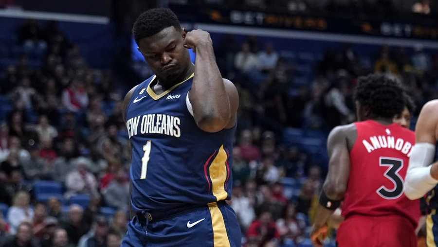 new orleans pelicans forward zion williamson (1) flexes his bicep after scoring a basket in the first half of an nba basketball game against the toronto raptors in new orleans, wednesday, nov. 30, 2022. (ap photo/gerald herbert)