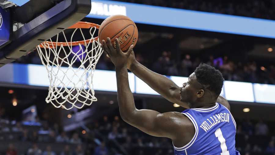 Duke's Zion Williamson (1) drives to the basket against North Carolina during the first half of an NCAA college basketball game in the Atlantic Coast Conference tournament in Charlotte, N.C., Friday, March 15, 2019.