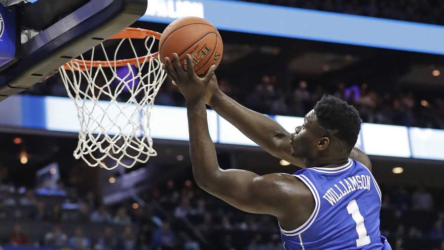 Duke's Zion Williamson (1) drives to the basket against North Carolina during the first half of an NCAA college basketball game in the Atlantic Coast Conference tournament in Charlotte, N.C., Friday, March 15, 2019.
