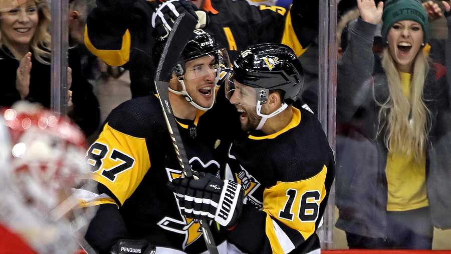 Pittsburgh Penguins' Jason Zucker (16) celebrates his goal with
