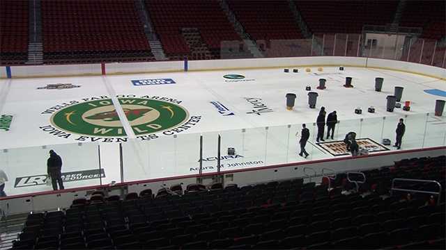 Crews prepare the arena for new ice for the 2016 hockey season.