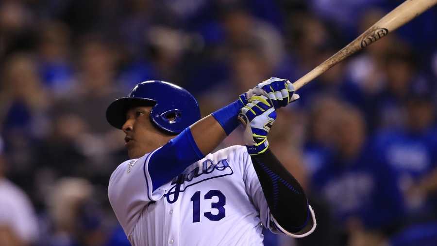 Kansas City Royals' Salvador Perez hits a three-run home run off Detroit Tigers relief pitcher Blaine Hardy (65) during the fifth inning of a baseball game at Kauffman Stadium in Kansas City, Mo., Tuesday, April 19, 2016. (AP Photo/Orlin Wagner)