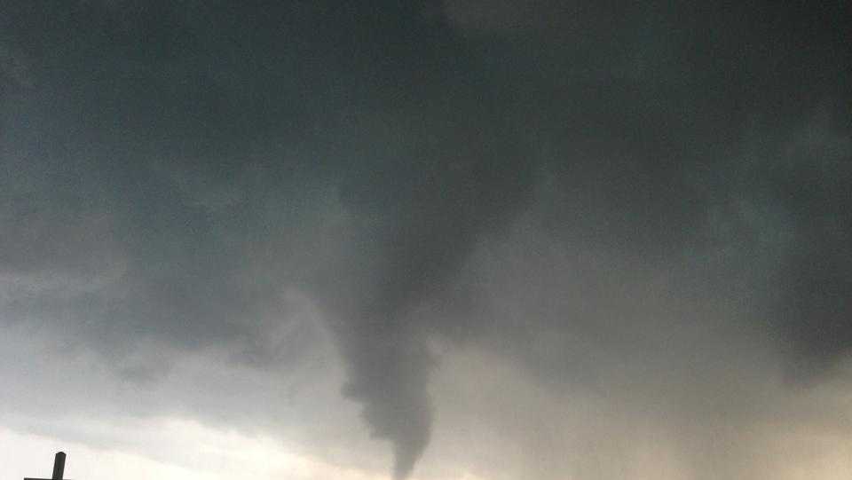 Family photo swept away in tornado found 200 miles away