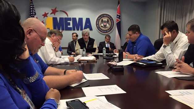 Gov. Phil Bryant is updated on storm recovery and operations at the Mississippi Emergency Management Agency headquarters.